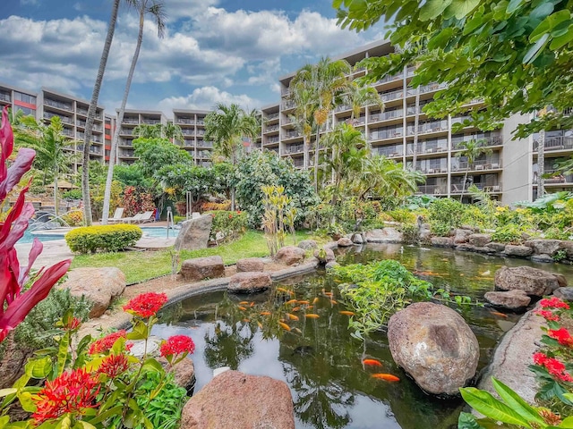 view of nearby features featuring a pool