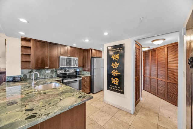 3445 Lower Honoapiilani Rd Unit 311, Lahaina, HI 96761 - kitchen with stainless steel appliances, open shelves, a sink, light stone counters, and decorative backsplash