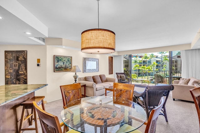 3445 Lower Honoapiilani Rd Unit 311, Lahaina, HI 96761 - dining space with light colored carpet and recessed lighting