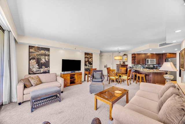 3445 Lower Honoapiilani Rd Unit 311, Lahaina, HI 96761 - living room featuring light carpet