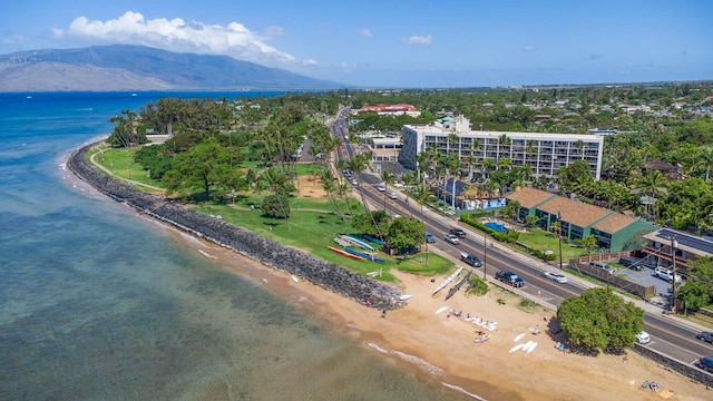 bird's eye view with a water and mountain view