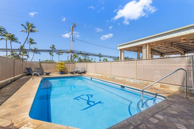 view of pool featuring a fenced in pool and a fenced backyard