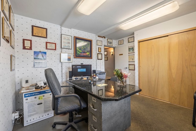 carpeted office space with wallpapered walls