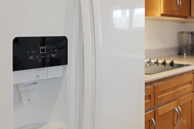 interior details with black electric stovetop
