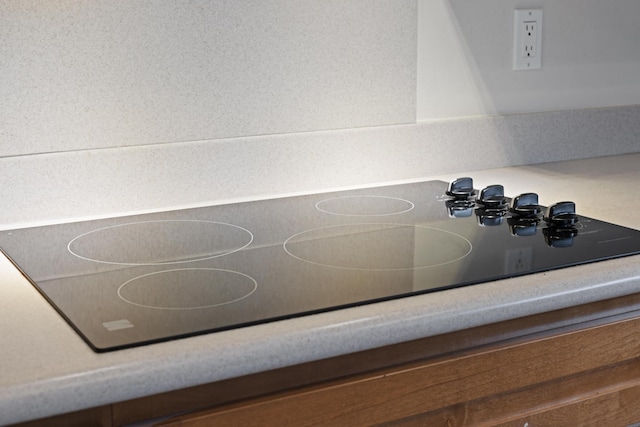 details with black electric cooktop