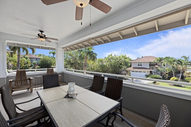 exterior space featuring a balcony and ceiling fan