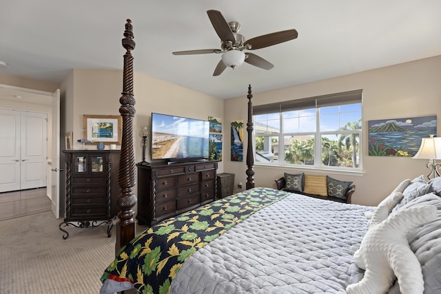 carpeted bedroom with ceiling fan