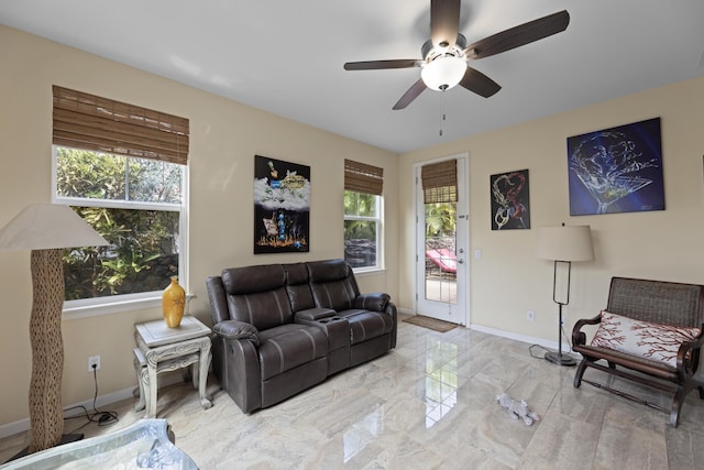 living room with ceiling fan