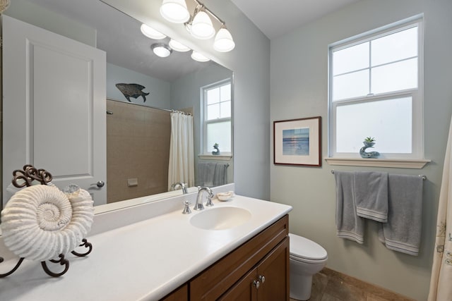 bathroom with vanity, tile patterned flooring, a shower with curtain, and toilet