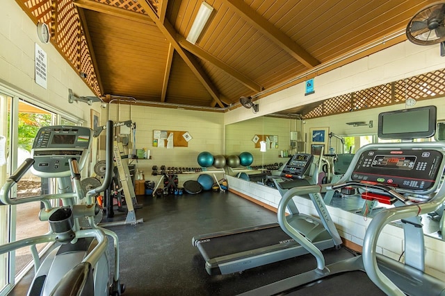 gym featuring wooden ceiling and vaulted ceiling