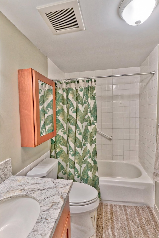 49 W Lipoa St Unit 107, Kihei, HI 96753 - bathroom with vanity, shower / bath combo with shower curtain, and tile patterned floors