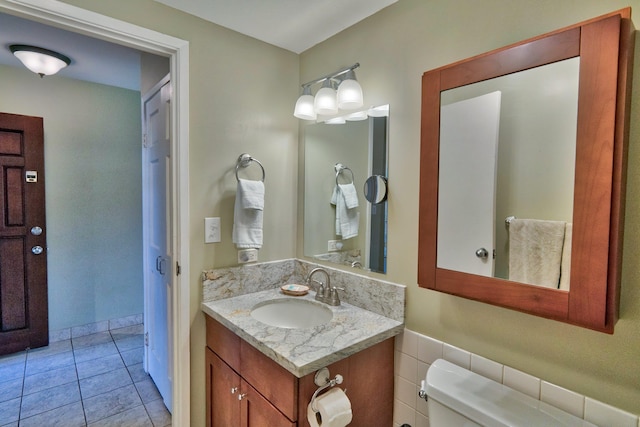 49 W Lipoa St Unit 107, Kihei, HI 96753 - half bath with vanity and tile patterned flooring