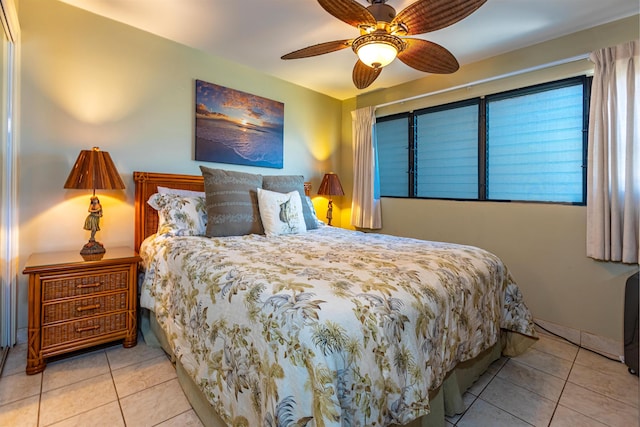49 W Lipoa St Unit 107, Kihei, HI 96753 - tiled bedroom featuring ceiling fan