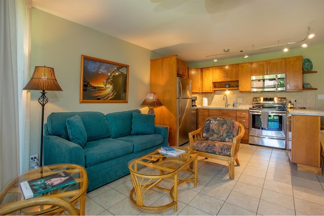 49 W Lipoa St Unit 107, Kihei, HI 96753 - living room featuring light tile patterned floors