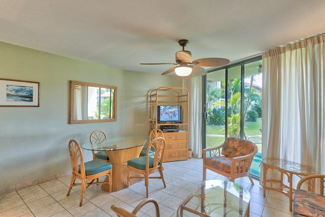 49 W Lipoa St Unit 107, Kihei, HI 96753 - dining area with healthy amount of natural light, a ceiling fan, and light tile patterned floors