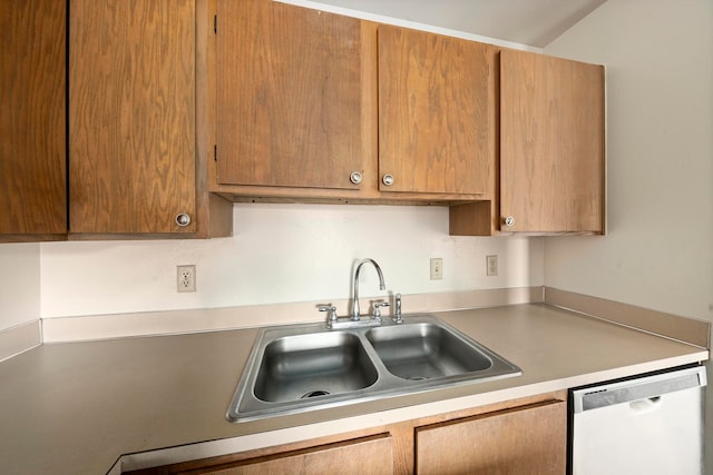 kitchen featuring dishwasher and sink