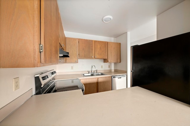 kitchen with appliances with stainless steel finishes and sink