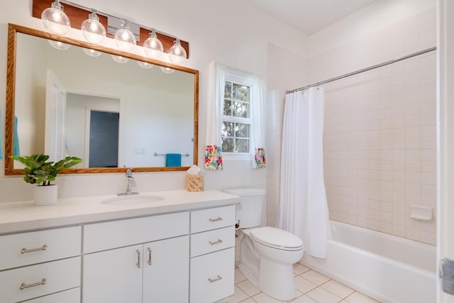 full bathroom featuring toilet, tile patterned floors, vanity, and shower / bathtub combination with curtain