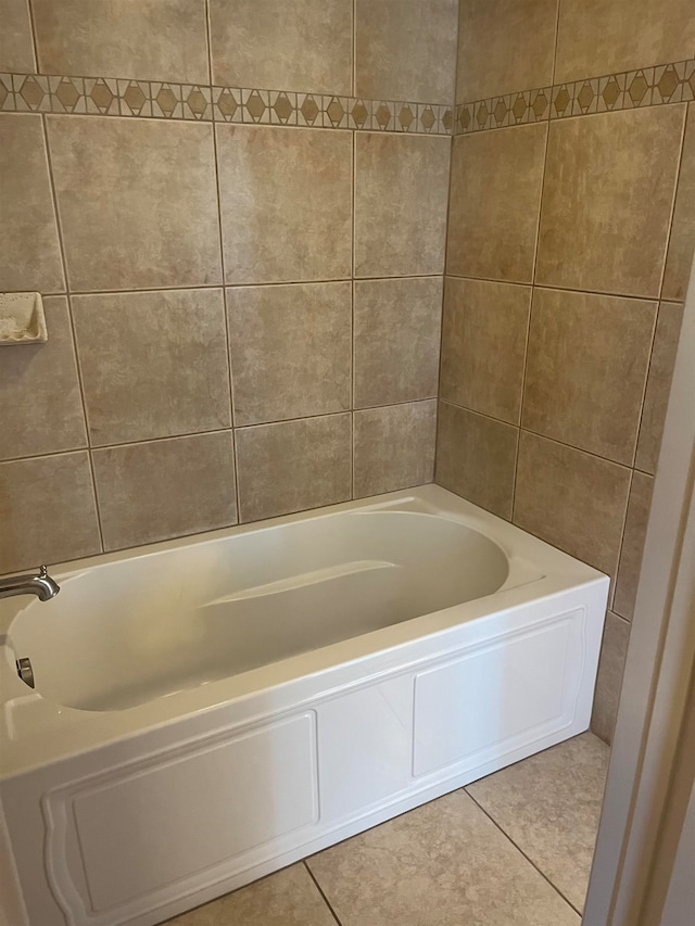 bathroom featuring a bathing tub and tile patterned floors