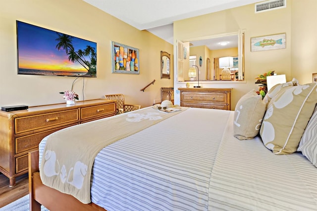 2560 Kekaa Dr Unit F 102, Lahaina, HI 96761 - bedroom featuring wood finished floors