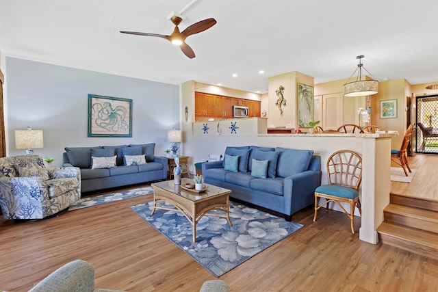 2560 Kekaa Dr Unit F 102, Lahaina, HI 96761 - living room featuring ceiling fan, light wood-style floors, and recessed lighting