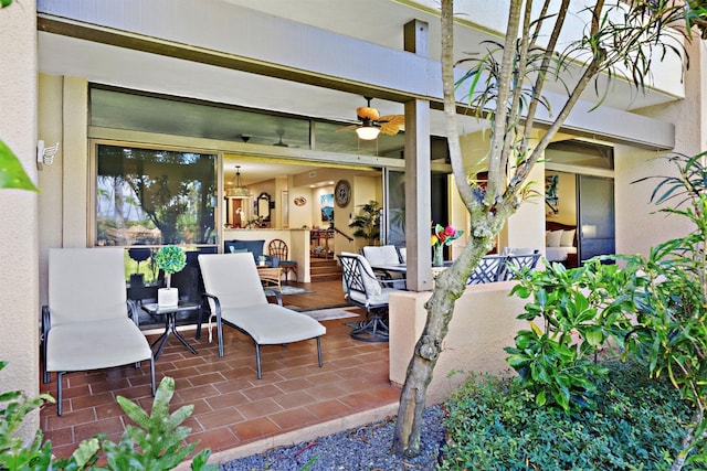 2560 Kekaa Dr Unit F 102, Lahaina, HI 96761 - view of patio / terrace with a ceiling fan and outdoor dining space