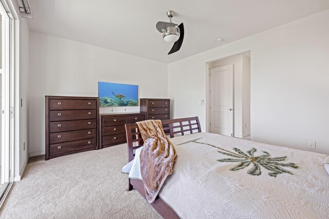 bedroom featuring a ceiling fan and carpet floors