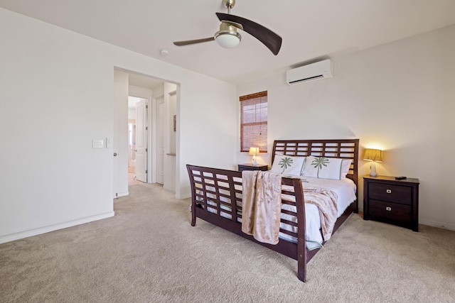 carpeted bedroom featuring baseboards, a ceiling fan, and a wall mounted AC