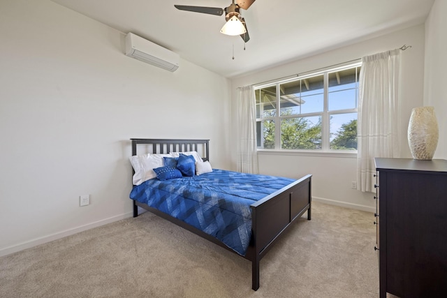 bedroom featuring baseboards, light colored carpet, ceiling fan, and a wall mounted AC