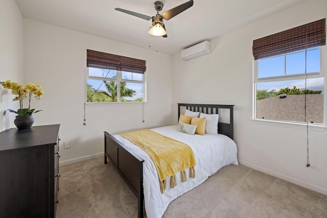 bedroom featuring light carpet, baseboards, a ceiling fan, and an AC wall unit