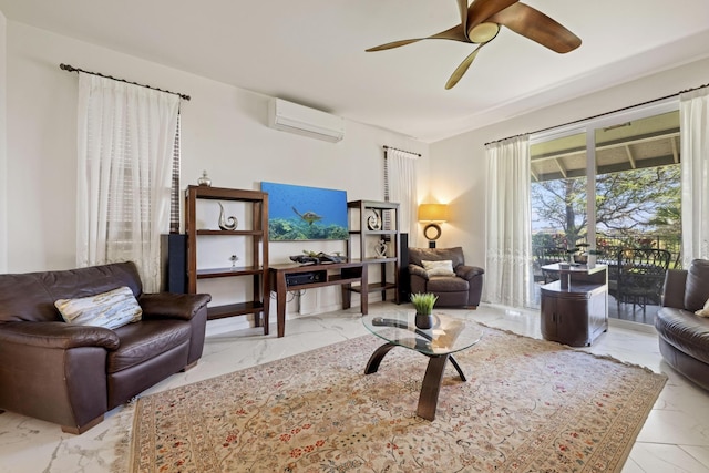 living area featuring a ceiling fan, marble finish floor, and a wall unit AC