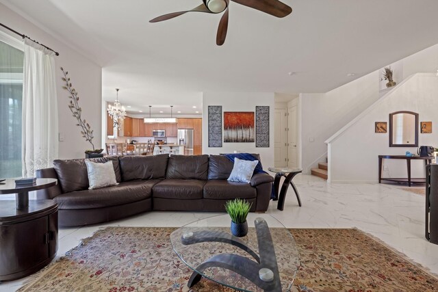 living room featuring stairs, ceiling fan with notable chandelier, marble finish floor, and recessed lighting