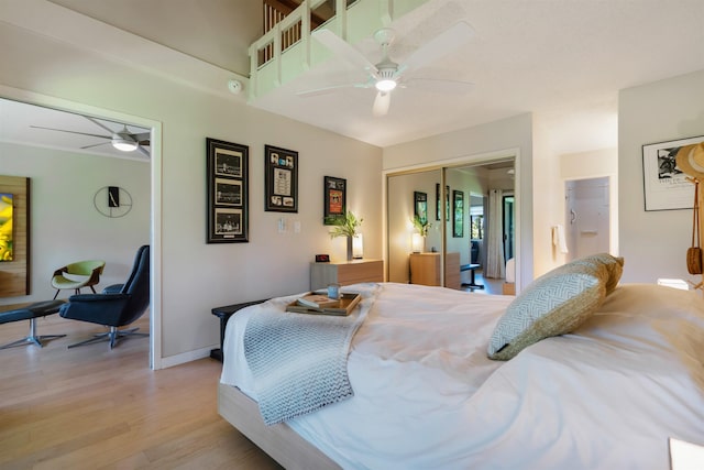 3788 Lower Honoapiilani Rd Unit E212, Lahaina, HI 96761 - bedroom featuring light wood finished floors, baseboards, and ceiling fan