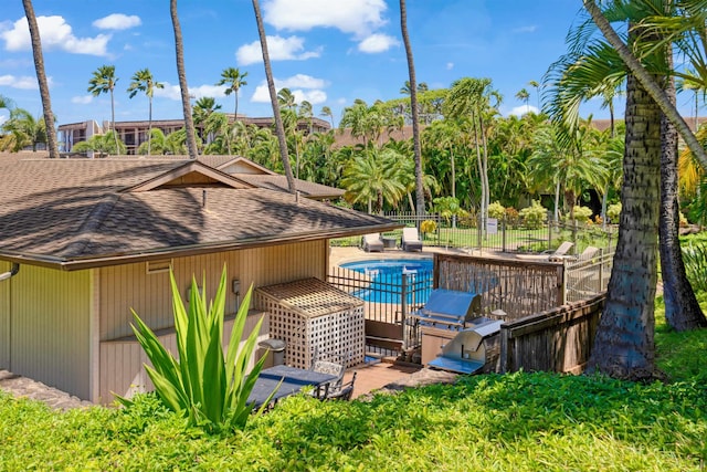3788 Lower Honoapiilani Rd Unit E212, Lahaina, HI 96761 - view of side of home featuring roof with shingles