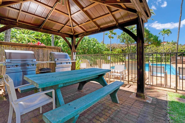 3788 Lower Honoapiilani Rd Unit E212, Lahaina, HI 96761 - view of patio / terrace featuring a gazebo, outdoor dining area, and area for grilling