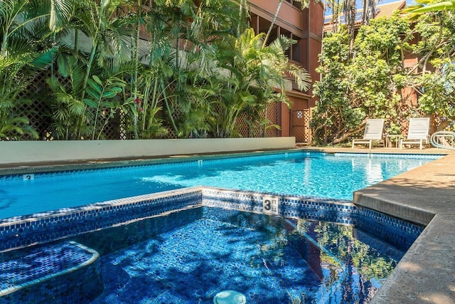 pool with a hot tub