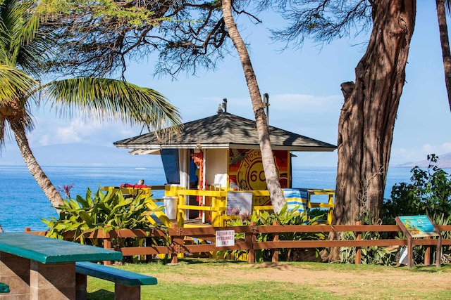 bungalow-style house featuring a water view