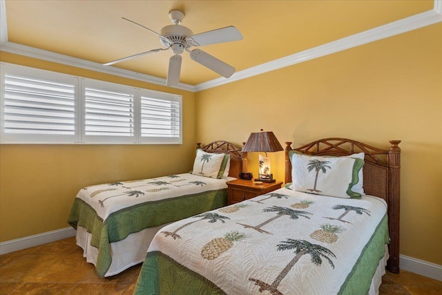 bedroom featuring dark tile patterned floors, ceiling fan, and ornamental molding