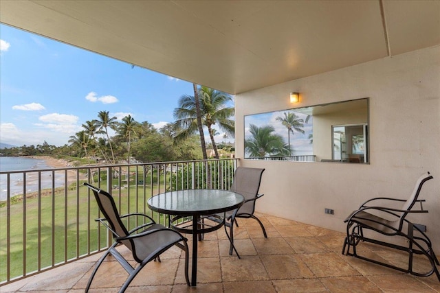 balcony featuring a water view