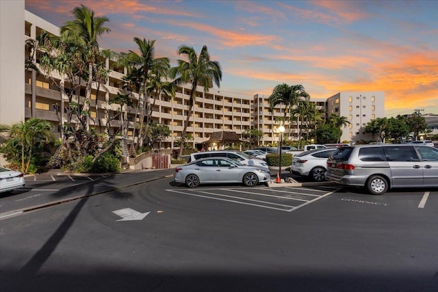 view of parking at dusk