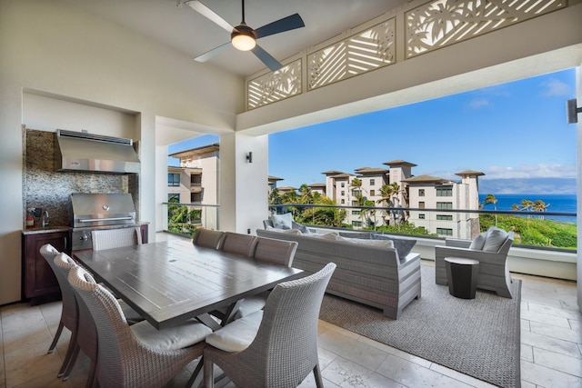 view of patio with an outdoor hangout area, a water view, a grill, a ceiling fan, and outdoor dining space