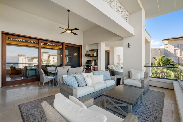 view of patio / terrace featuring a balcony, an outdoor living space, a ceiling fan, and area for grilling