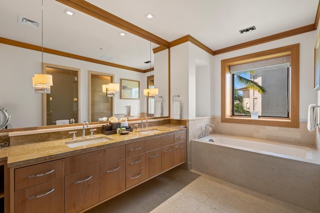 bathroom featuring visible vents, a sink, a garden tub, and double vanity