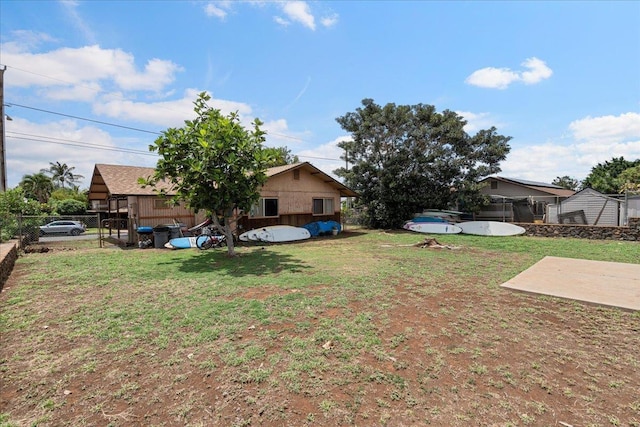 view of yard featuring fence