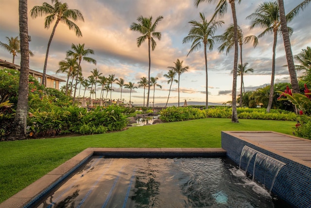 3800 Wailea Alanui Dr Unit B-102, Kihei, HI 96753 - pool at dusk featuring a yard