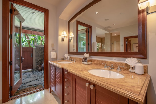 3800 Wailea Alanui Dr Unit B-102, Kihei, HI 96753 - full bath featuring double vanity, tile patterned flooring, and a shower with door