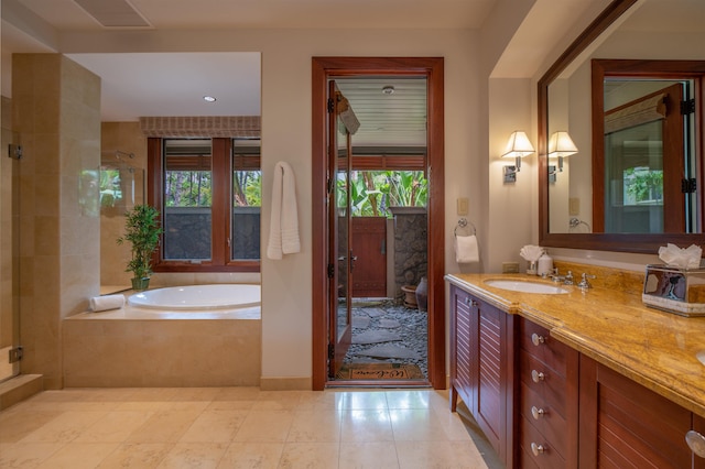 3800 Wailea Alanui Dr Unit B-102, Kihei, HI 96753 - full bath with a garden tub, plenty of natural light, double vanity, tiled shower, and recessed lighting