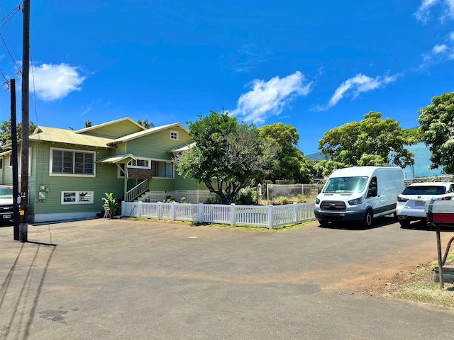 view of front of house featuring central air condition unit