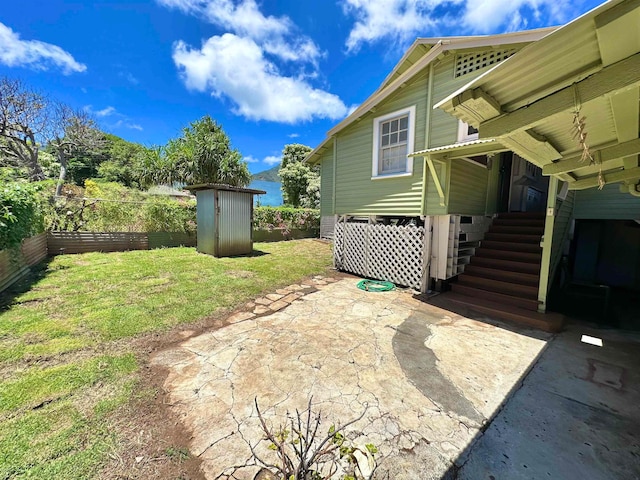 exterior space featuring a shed