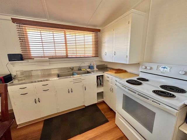 kitchen with white electric stove, white cabinets, light hardwood / wood-style flooring, stainless steel counters, and sink